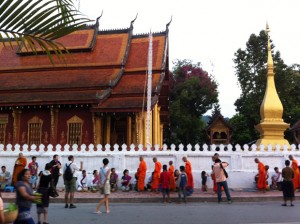 Respecting the morning alms in Luang Prabang